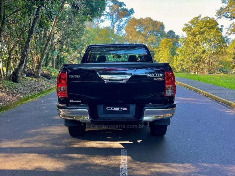 TOYOTA - HILUX - 2020/2020 - Preta - R$ 213.000,00